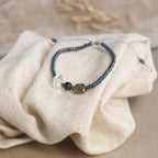 Buddha Armband mit Tigerauge grau und Bergkristall - | trueffeldesign