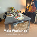 Vorbereiteter Tisch mit Snacks und Materialien für Mala Workshop